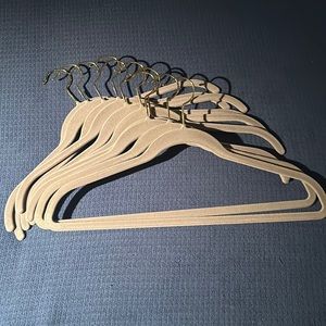 20 grey Joy Mangano Huggable Hangers w/goldtone hooks.